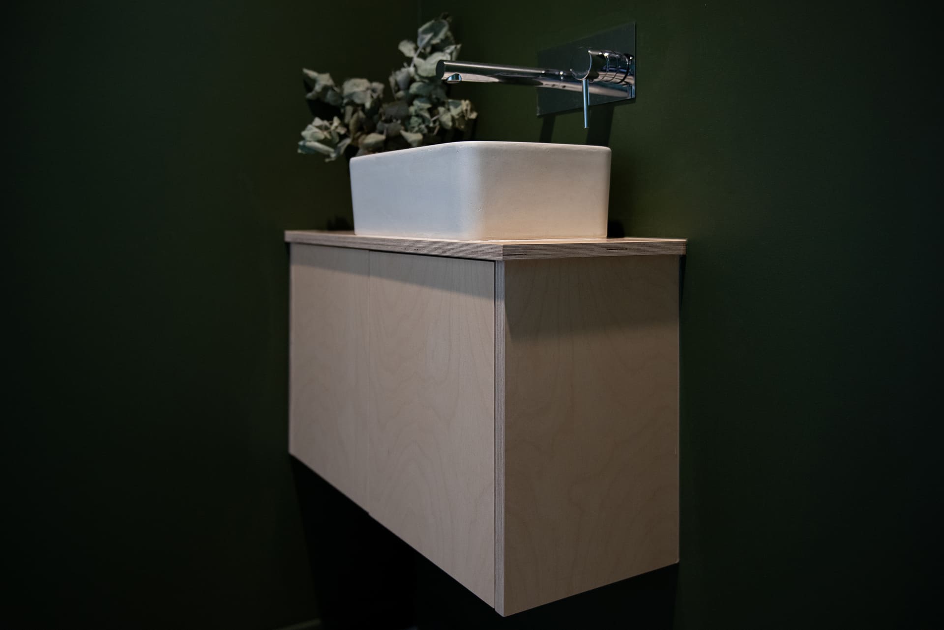 Timber vanity with white sink and silver tap